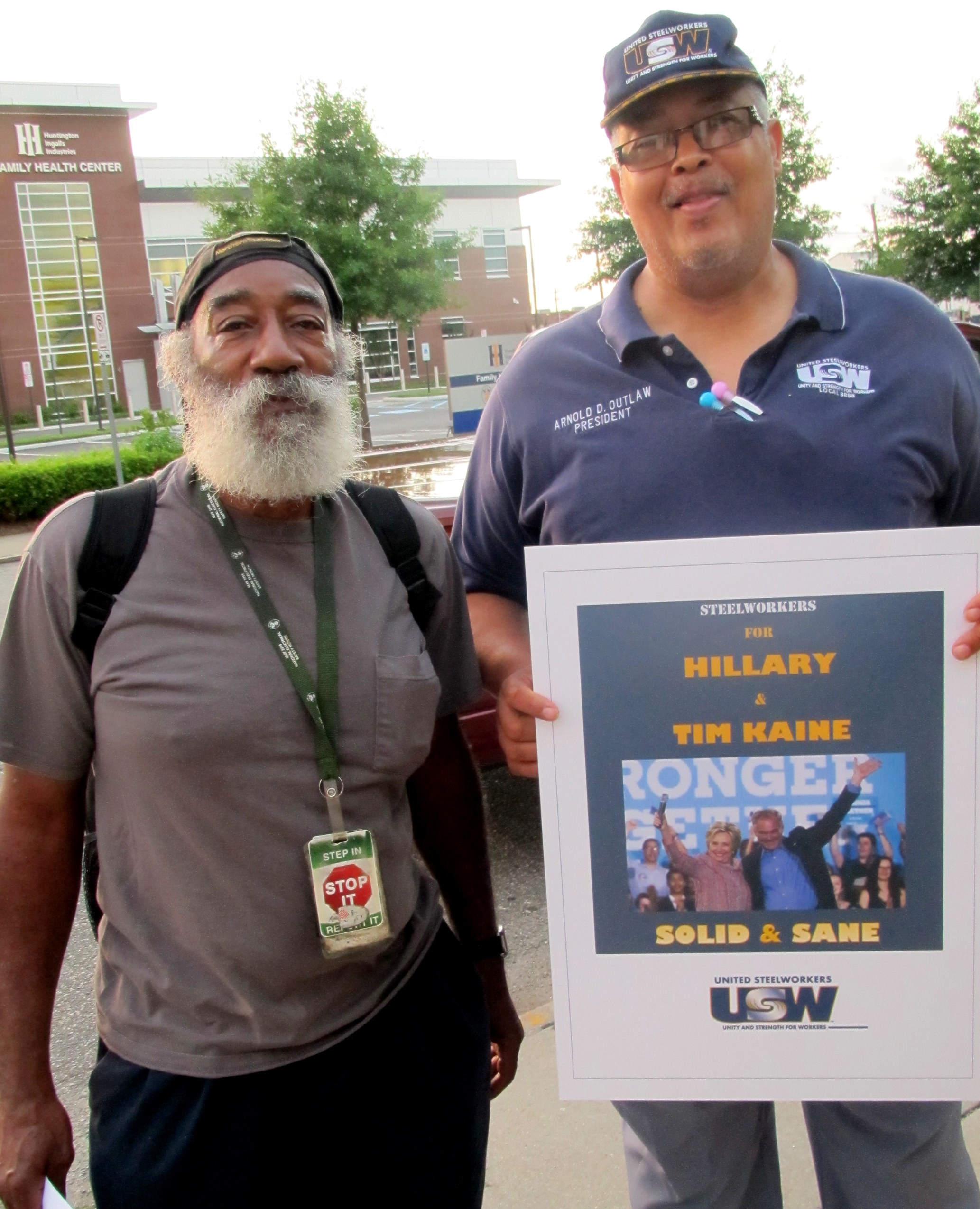 USW Local 8888 President Arnold Outlaw (right) joined other members and staff to rev up support for Hillary Clinton and Tim Kaine at the Newport News shipyard.